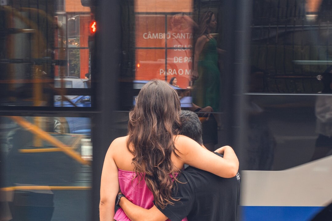 two people hugging after argument