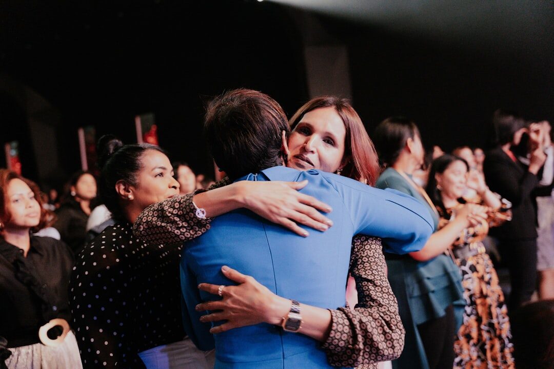 actresses hugging at premiere