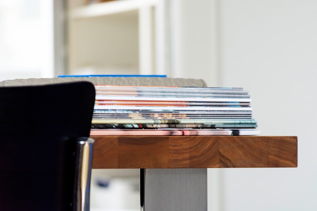 Stack of magazines and newspapers on a table